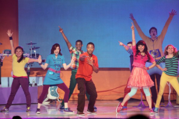 The Fresh Beat Band on one of their many tours. Hear more about what they're shows are like in this episde!